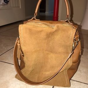 Boutique find. Turns into a back pack.